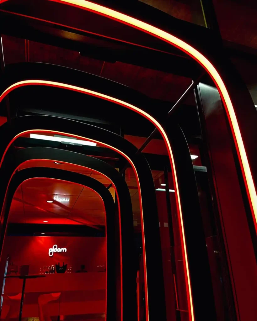 Top-bend red neon flex LED arch close-up at Ploom Roppongi pop-up