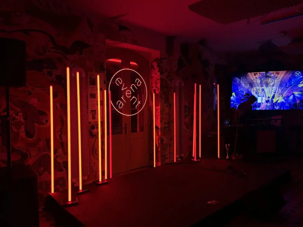 Red neon flex LED arch tunnel entry at Ploom pop-up in Tokyo