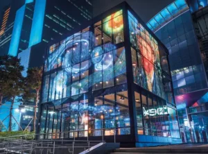 Media facade lighting with addressable LED strip on a building exterior