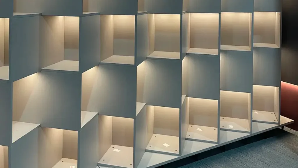 Wall shelves lit by a CRI 90 retail display LED strip high CRI COB installation at a Bilbao concept store